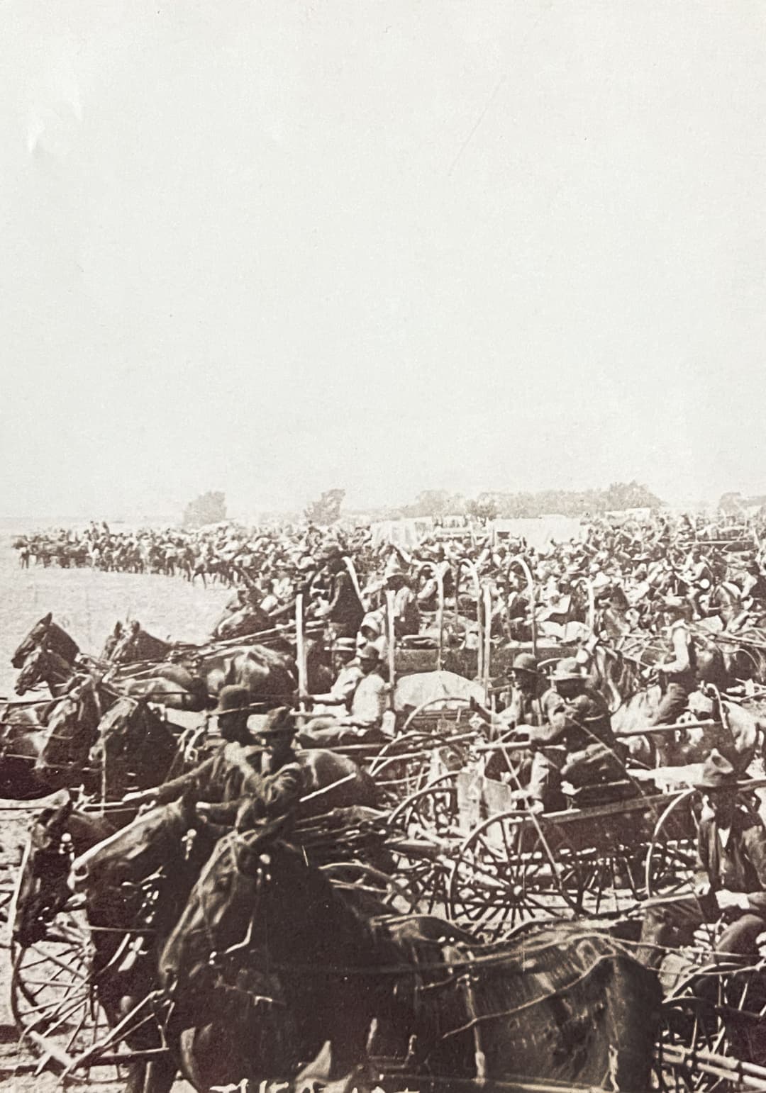 Historic photograph of settlers racing during the Cherokee Outlet Land Run of 1893 - the pivotal event that shaped Oklahoma's history and Land Run Distillery's heritage